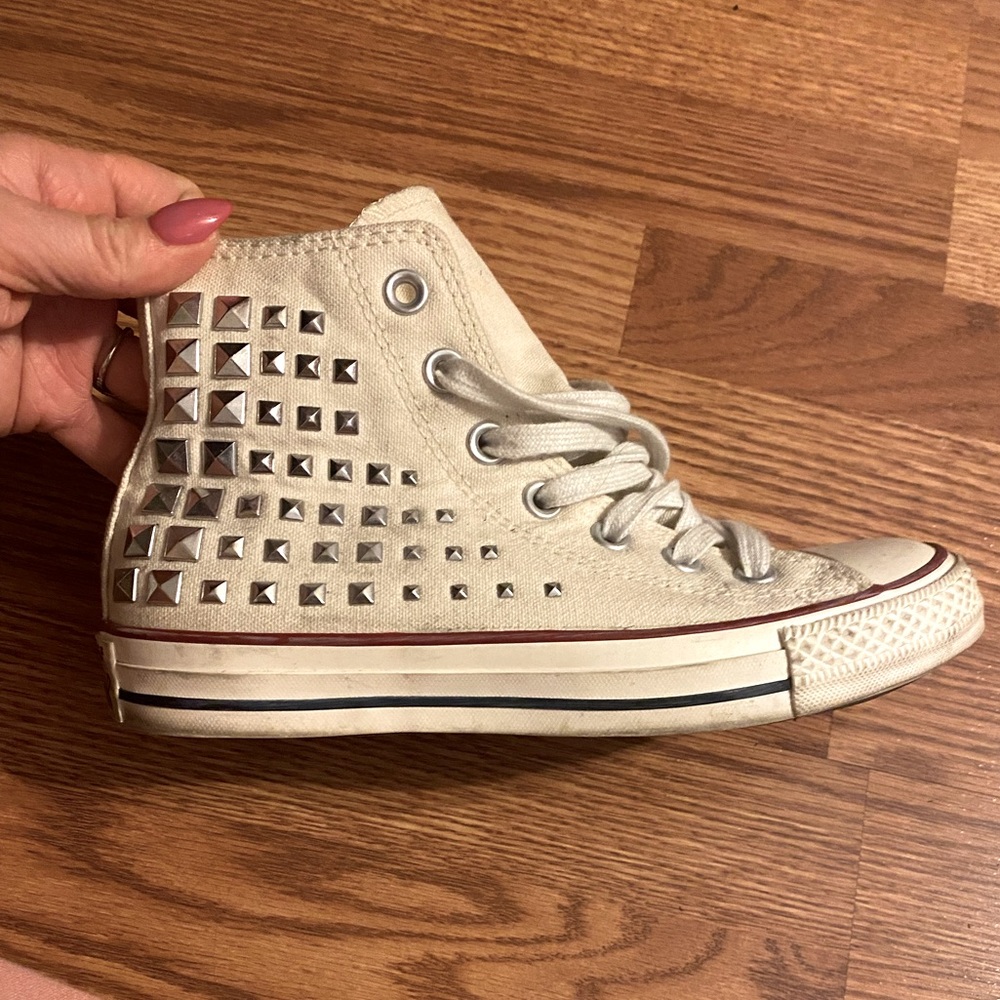 Gently used high top Converse with studs.